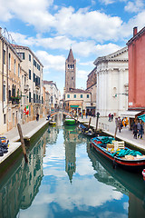 Image showing Boats moored along water canal in Venice 