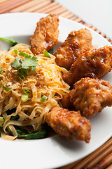 Image showing Chicken Wings with Noodles and Spinach