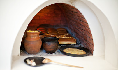Image showing big stove with food inside