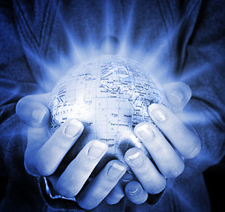 Image showing Globe in a girl's hands