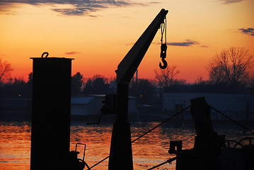 Image showing Boat cran and sunset at Sava river