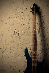 Image showing guitar near wall