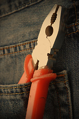 Image showing pliers in jeans pocket