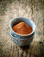 Image showing bowl of cinnamon powder