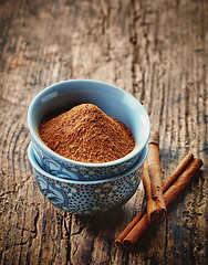 Image showing bowl of cinnamon powder