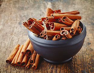 Image showing bowl of cinnamon sticks