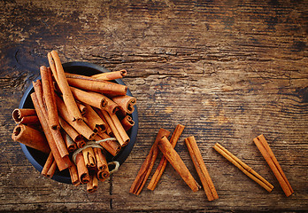 Image showing bowl of cinnamon sticks