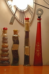 Image showing Row of decorative bottles