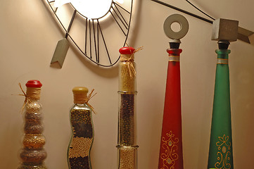 Image showing Row of decorative bottles