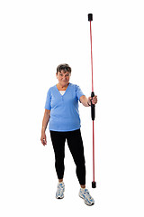 Image showing Senior woman with swing stick