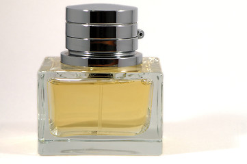 Image showing Bottle of perfume over white background