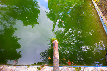 Image showing green piping fresh water reservoir