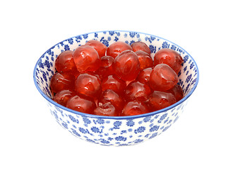 Image showing Glace cherries in a blue and white china bowl