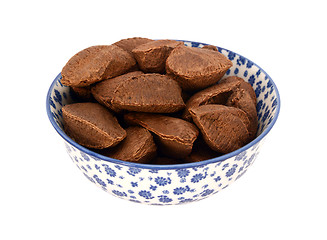 Image showing Brazil nuts in a blue and white china bowl