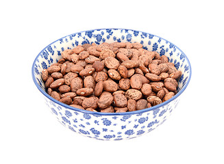 Image showing Pinto beans in a blue and white china bowl