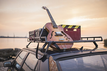 Image showing Music instrumental guitar car outdoor background