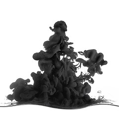 Image showing Splash of black ink in dropped into the water on white