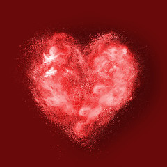 Image showing heart made of powder explosion on red