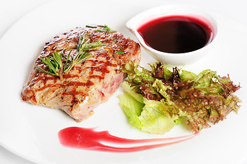 Image showing Grilled steaks and vegetable salad