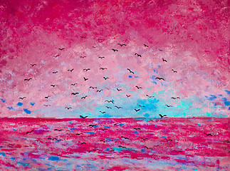 Image showing Sunset at the sea, birds in the sky