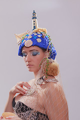 Image showing Beautiful woman with extravagant headdress