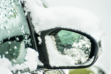 Image showing snowhat on a car mirror