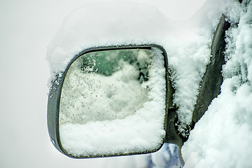 Image showing snowhat on a car mirror