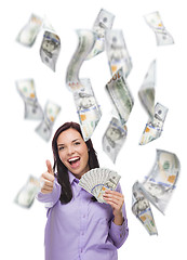 Image showing Happy Woman Holding the $100 Bills with Many Falling Around