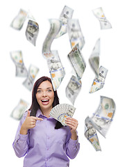 Image showing Happy Woman Holding the $100 Bills with Many Falling Around