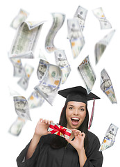 Image showing Female Graduate Holding $100 Bills with Many Falling Around Her