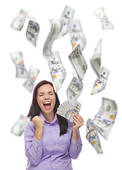 Image showing Happy Woman Holding the $100 Bills with Many Falling Around