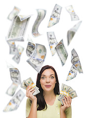 Image showing Happy Woman Holding the $100 Bills with Many Falling Around