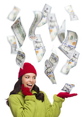 Image showing Young Excited Woman with $100 Bills Falling Around Her