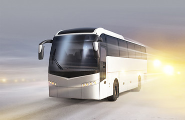 Image showing bus on ice road in blizzard