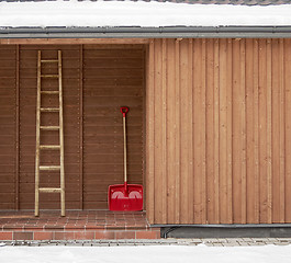 Image showing Red shovel and ladder