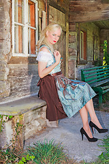 Image showing Fashionable young woman with Dirndl posing,