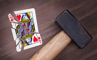 Image showing Hammer with a broken card, queen of hearts