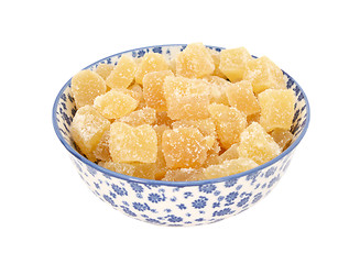 Image showing Crystallised stem ginger in a blue and white china bowl