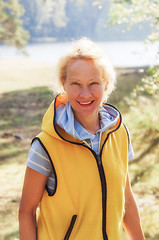 Image showing Portrait of a middle-aged woman in a park on a sunny day