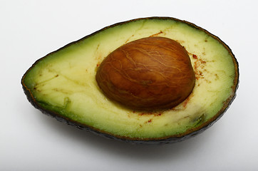 Image showing fresh half avocado on white background