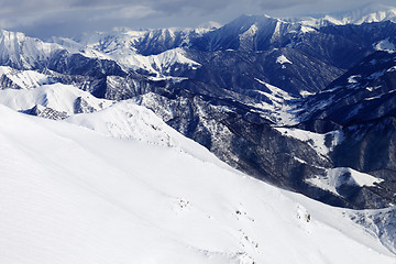 Image showing Off-piste slope and snowy mountains