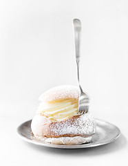 Image showing Semla cream bun on silver plate