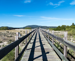 Image showing Walking on Wooden Walkway in the Sand Dunes