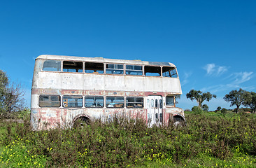 Image showing Rusty Abandoned Double-Decker Bus Standing in a Field