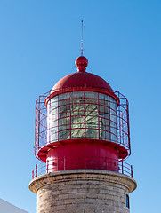 Image showing Red Lighthouse on the Background of Blue Sky