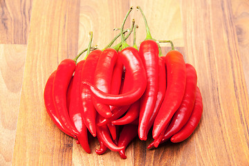 Image showing Many stacked red chili successive