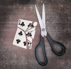 Image showing Concept of addiction, card with scissors