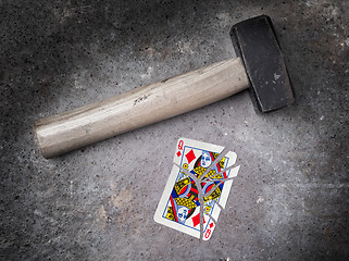 Image showing Hammer with a broken card, queen of diamonds
