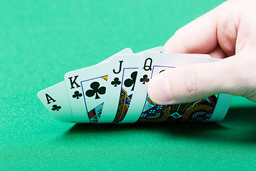 Image showing card player. Male hand with cards