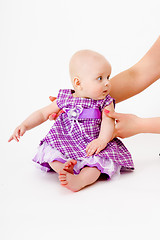 Image showing baby girl in a dress. studio